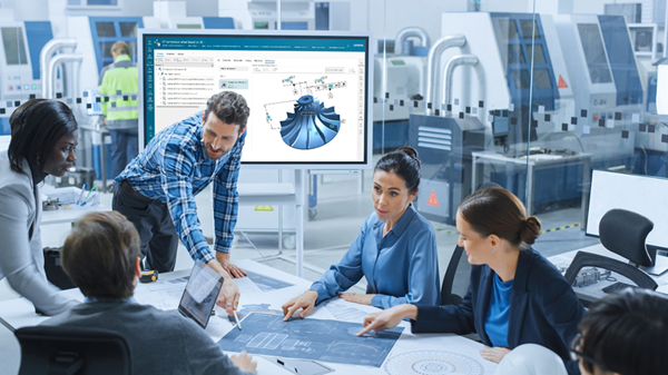 Team di professionisti discute un progetto CAD
